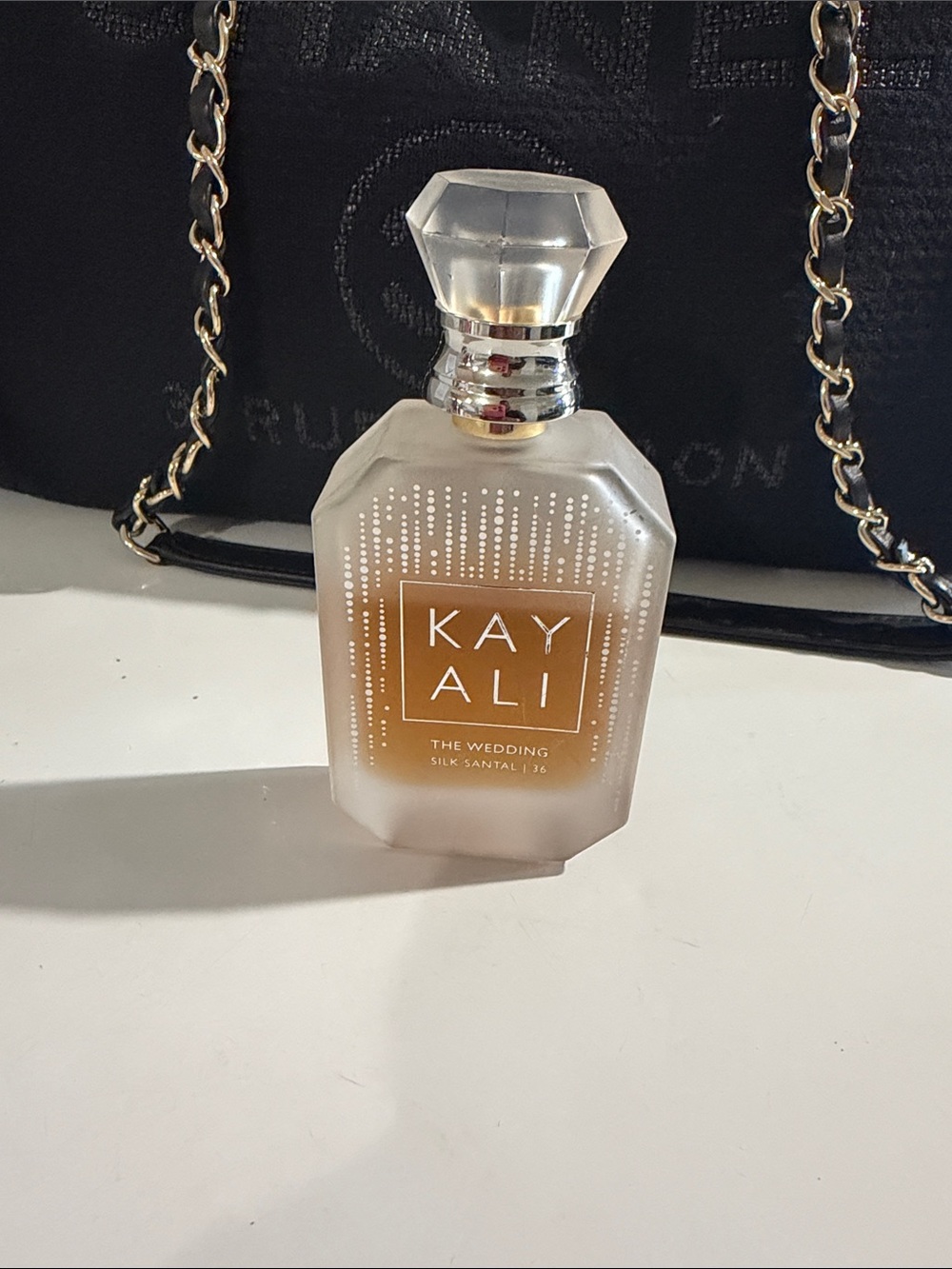 Kayali The Wedding Silk Santal Perfume Bottle - Frosted Glass, Amber Liquid